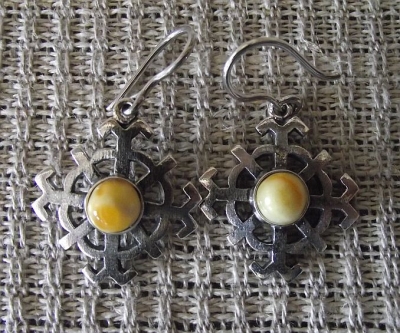 Sun Wheel Earrings With Amber Eye By Anda Ozola