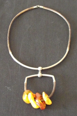 Amber Necklace with Four Wheels by Ieva  Bluķe